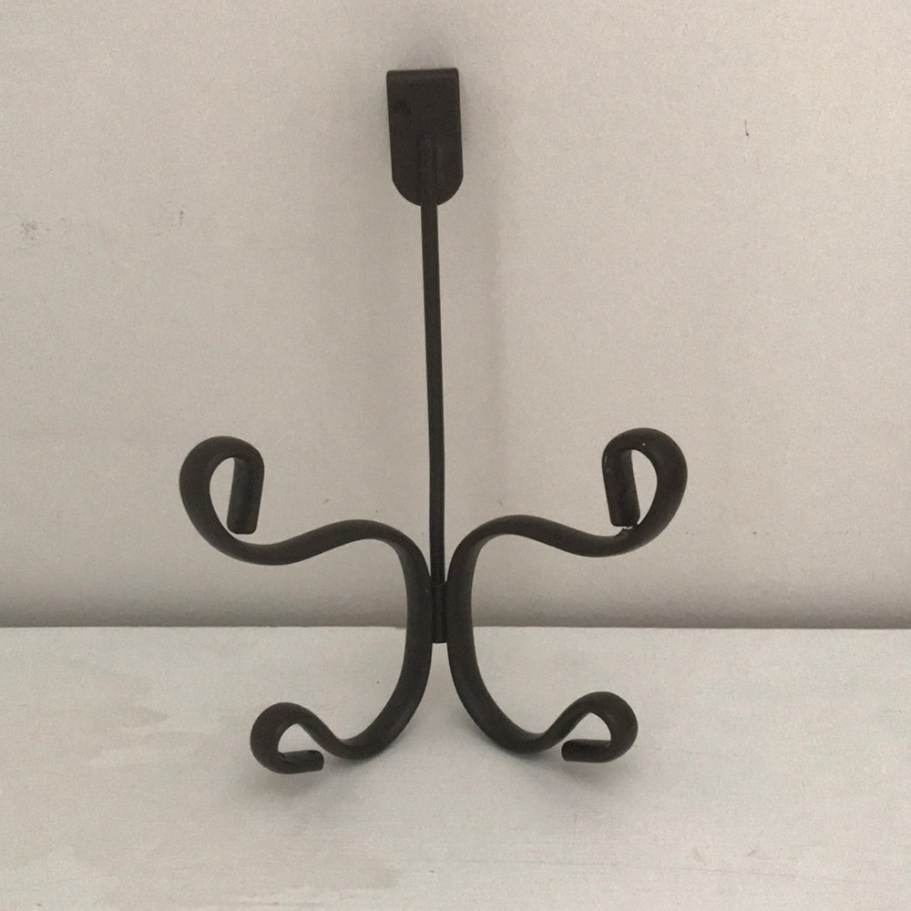Bronze rubbed over the door towel holder